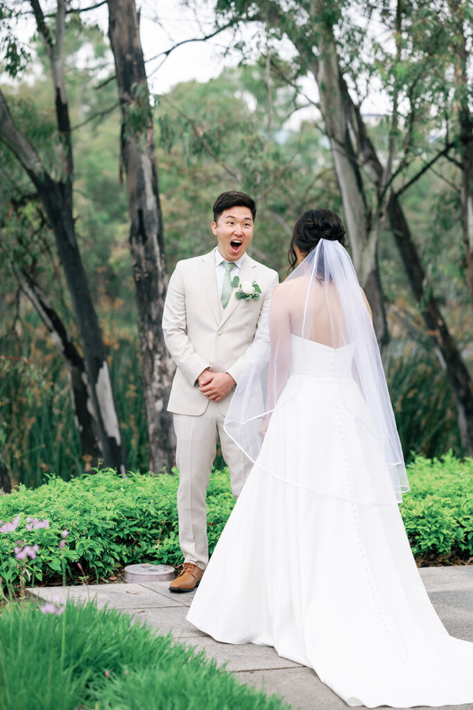 groom seeing bride crossline wedding