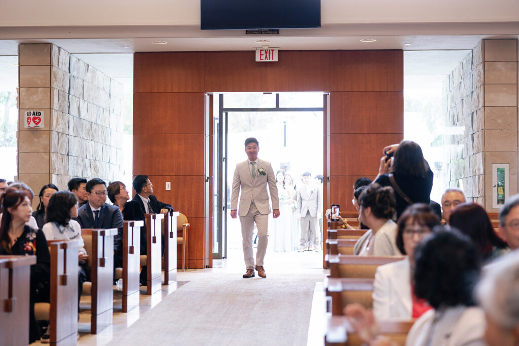 groom enters community church 