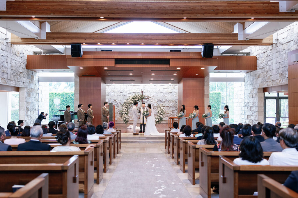 standing at the alter at crossline wedding