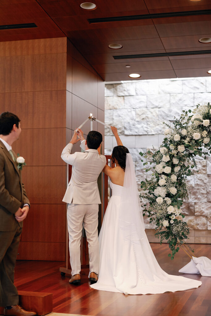 lighting the candles at community church wedding 