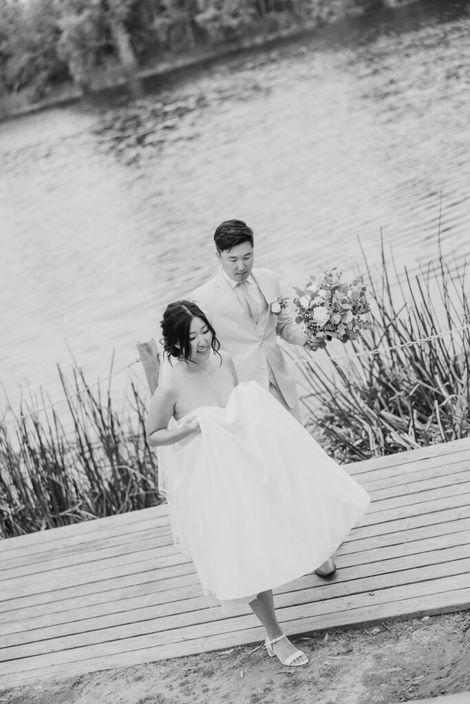 walking along the water at crossline wedding