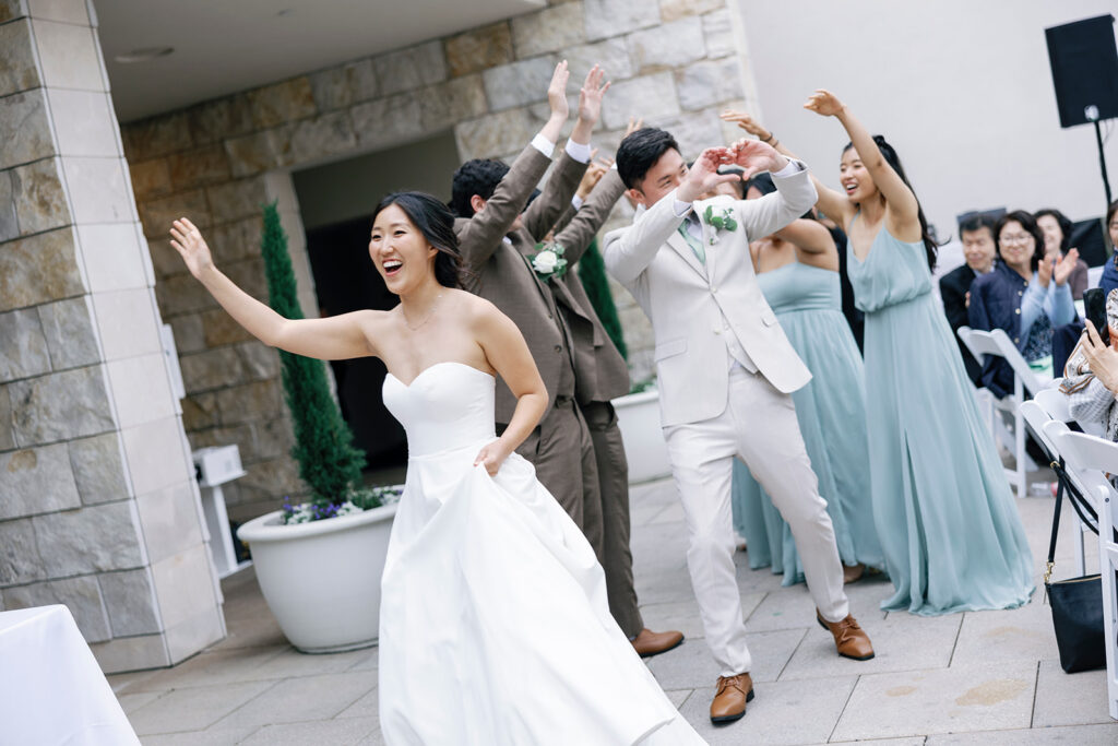 bride and groom entrance crossline wedding