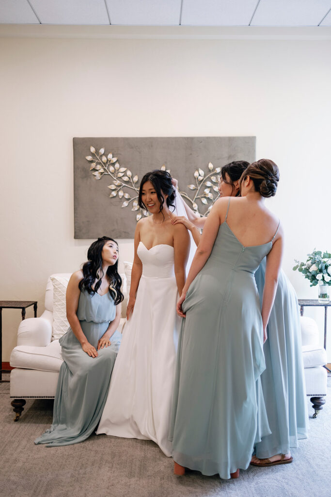 bride with her bridesmaids community church wedding