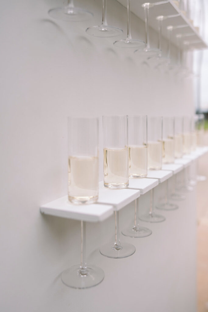 Champagne board at seaside wedding