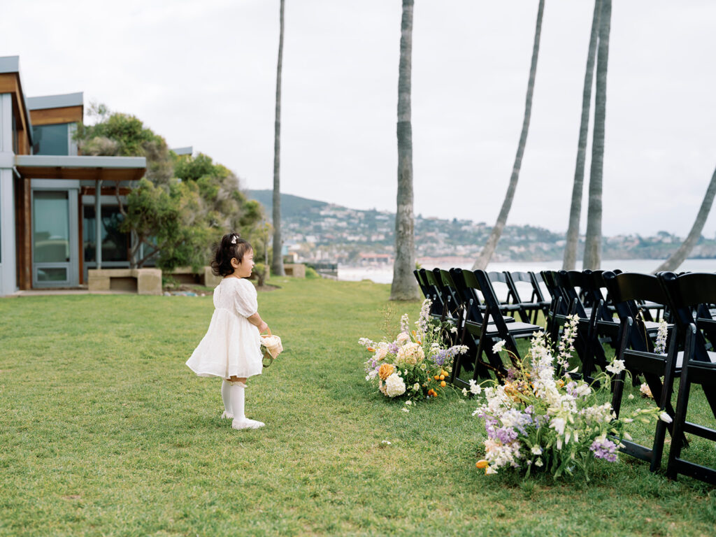 flower girl at seaside wedding