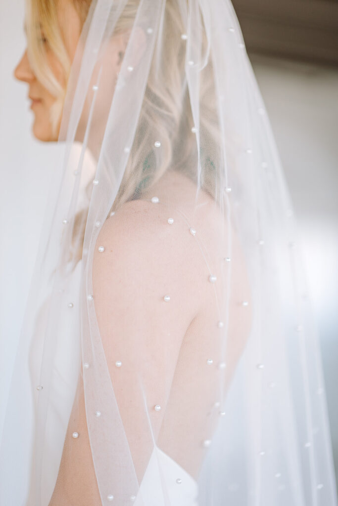 close up of bride wearing viel