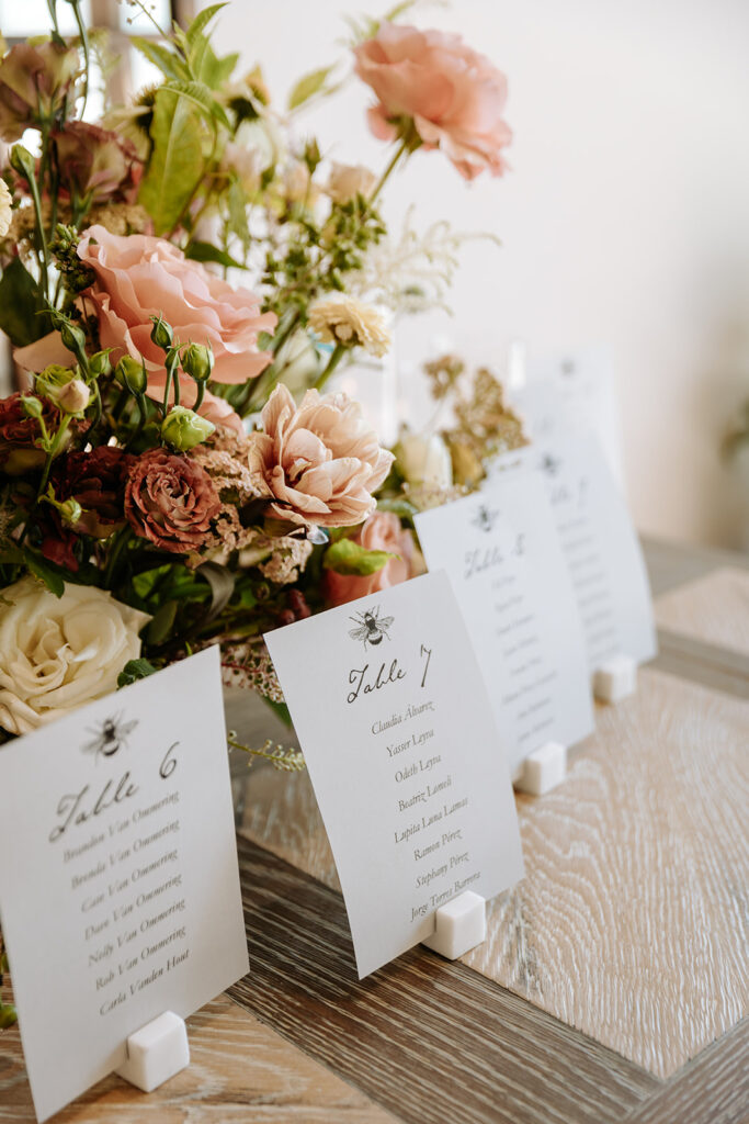 small seating chart with floral arrangement