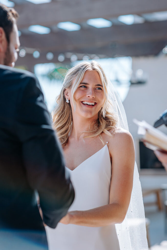 close up of bride during wedding ceremony at agape 1928 in san clemente