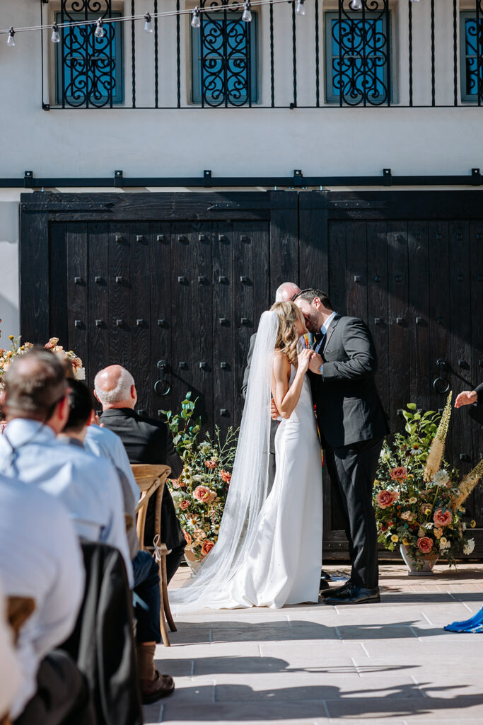 first kiss at agape 1928 wedding ceremony