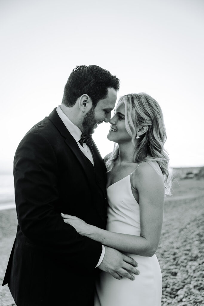 bride and groom golden hour photos on beach