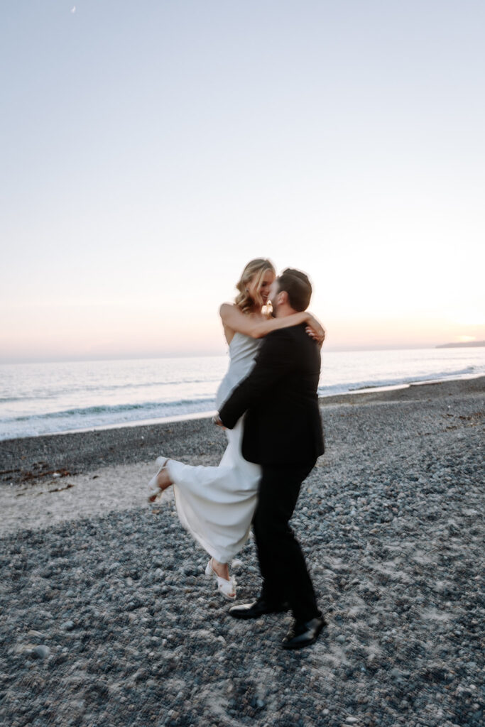 bride and groom golden hour photos on beach