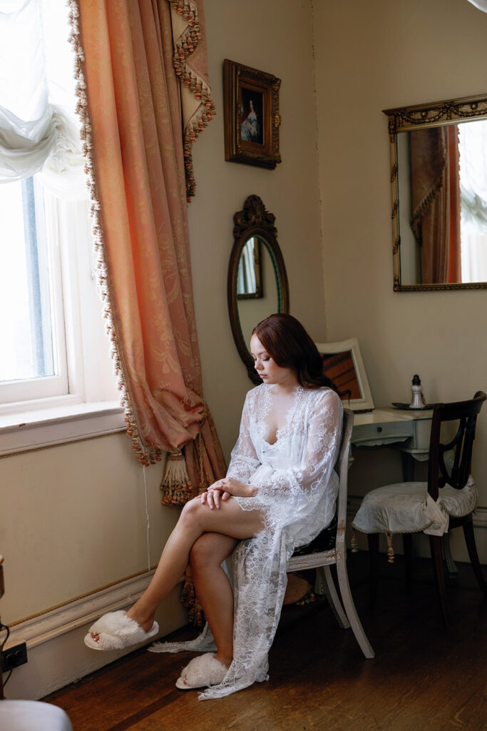 bride sitting by window