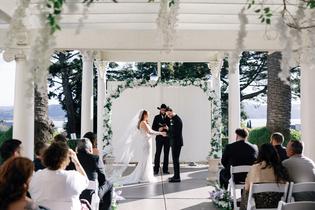 groom tearing up while seeing his bride at jefferson street mansion wedding 