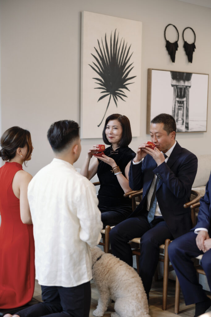 Family members enjoy sipping tea during the traditional ceremony