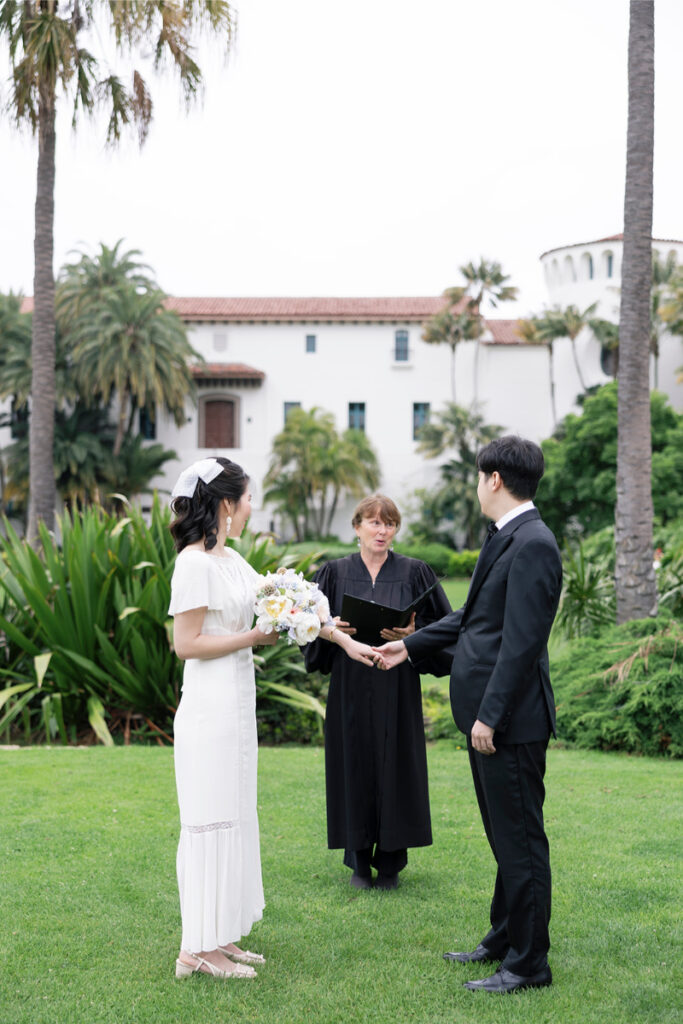 Bride and groom elope on the grounds of Santa Barbara Courthouse. 